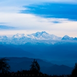 Cloudy sunrise of Kanchenjunga from the Tiger hill view point in Darjelling hills.